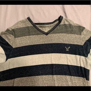 American Eagle 57% cotton-43%polyester. Athletic Fit-Size XL. No tears/holes.